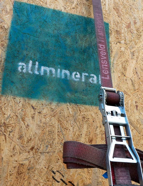 Upright view of an allmineral wooden container