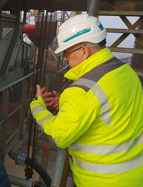 allmineral employee inspecting a plant