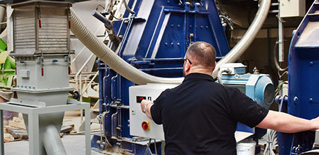 Employees inspecting a plant